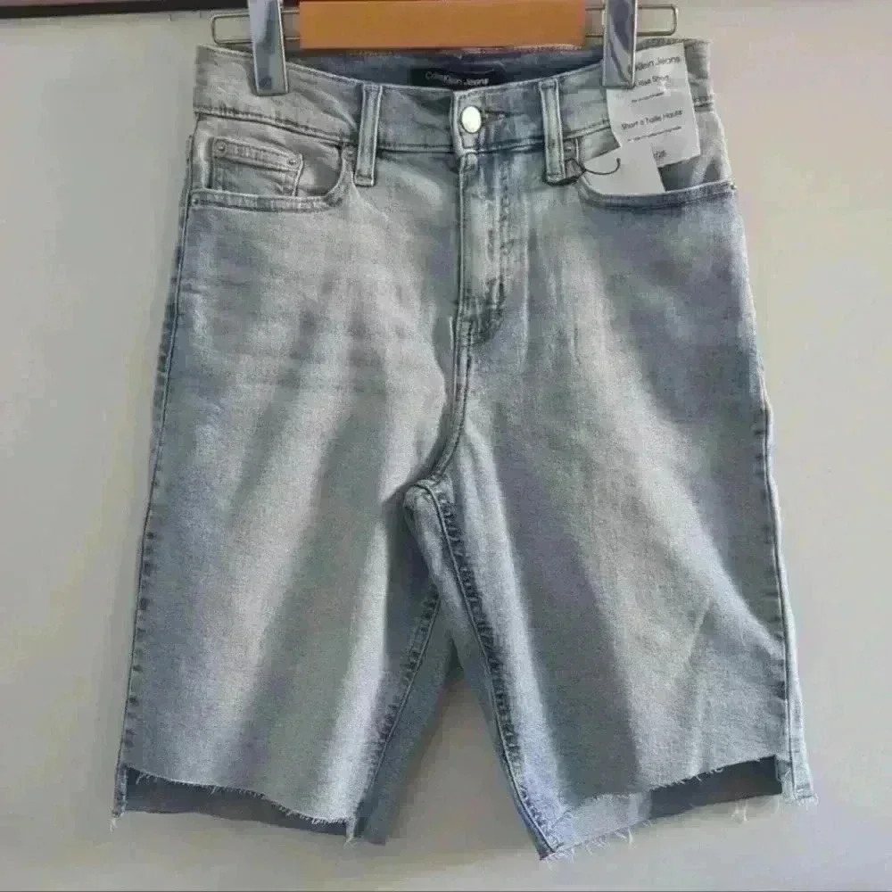 CALVIN KLEIN | Women's Light Wash High Rise Ripped Hem Shorts